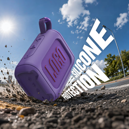 Purple JBL Go 4 silicone cover in an outdoor splash scene