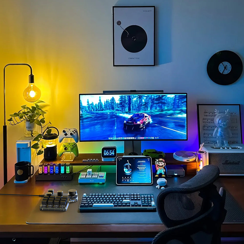 12-key programmable mini keyboard in a multi-device desk setup