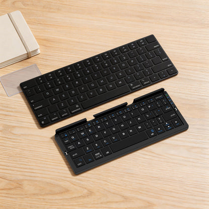 Black foldable Bluetooth keyboard shown open and folded